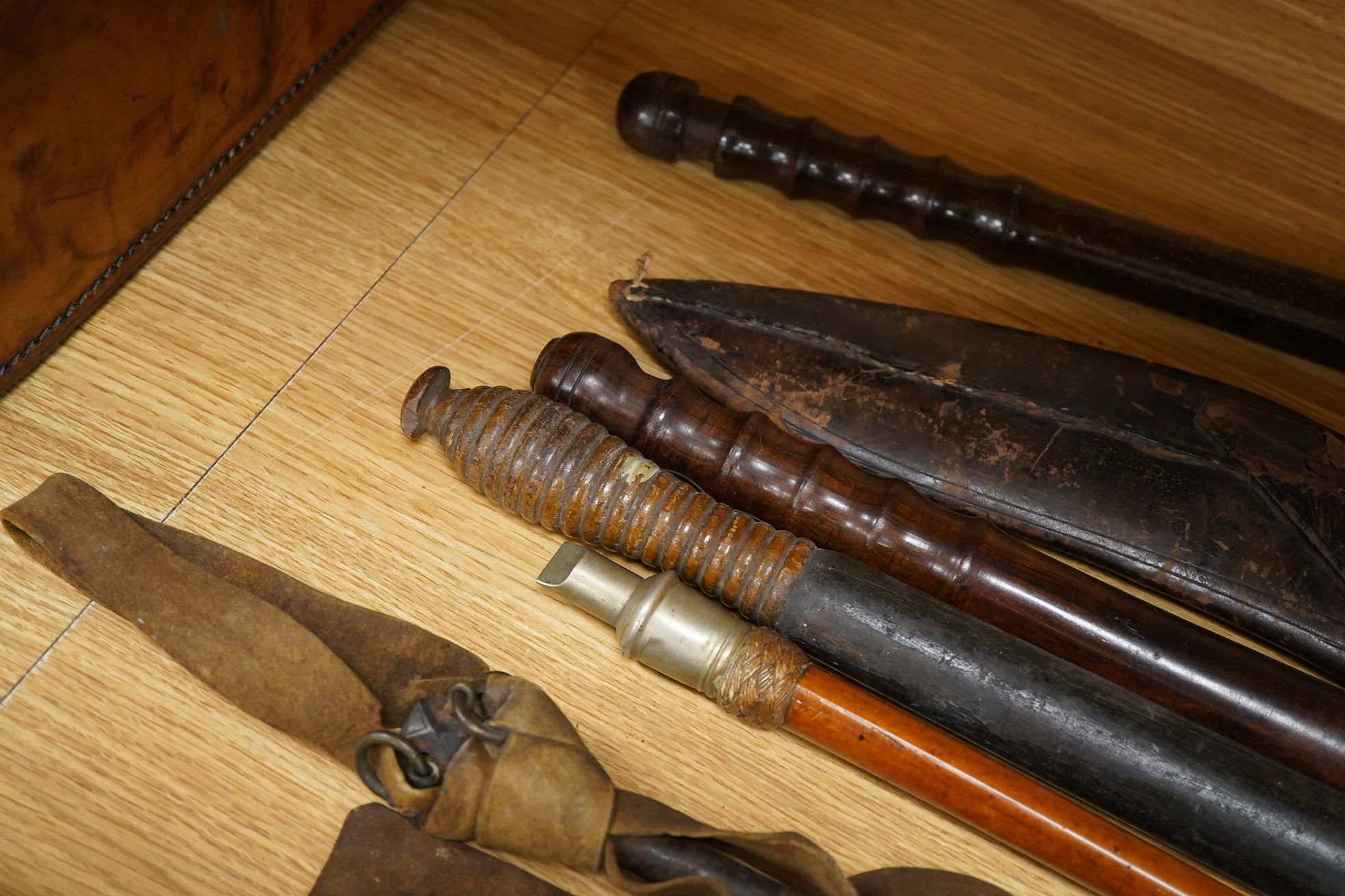 Three truncheons to include a Victorian painted example, a kukri, etc., painted truncheon 45cm